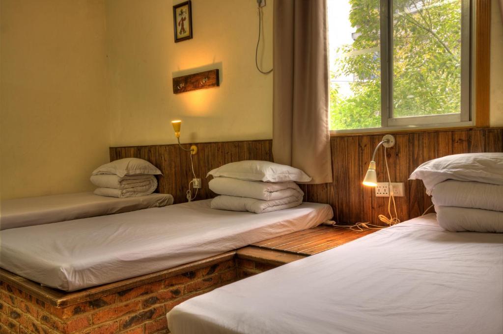 Guilin Wada Hostel Quarto foto
